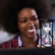 young woman at office looking at sand clock PPH7Z8K 2 1 scaled 1